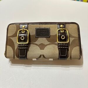 Brown Coach Wallet with Signature Pattern